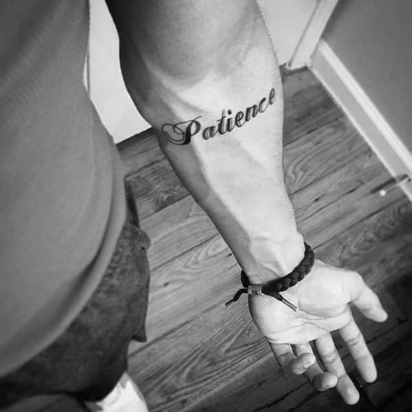Male With Cool Patience Tattoo Design On Inner Forearm