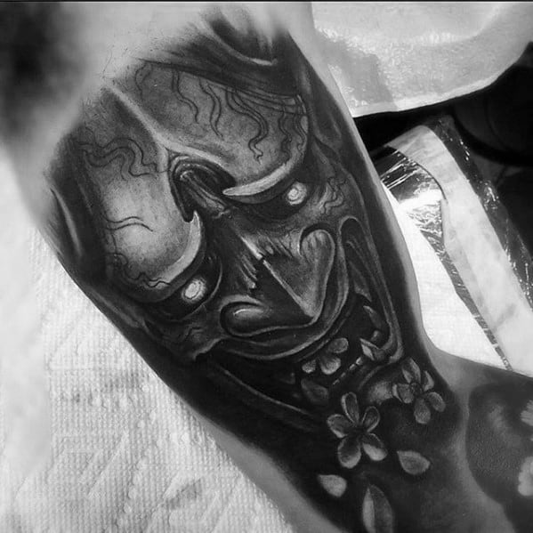 Male With Cool Rad Demon Mask Inner Arm Bicep Tattoo Design