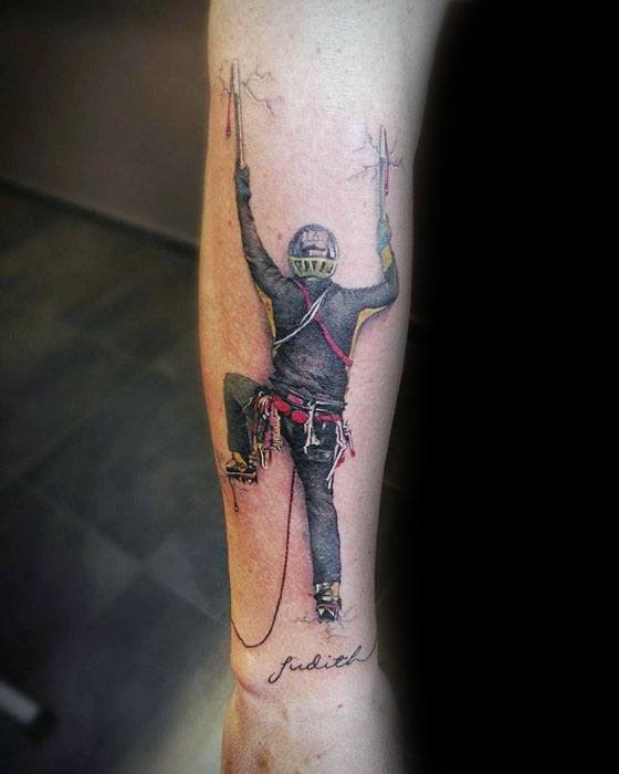 Male With Cool Rock Climbing Tattoo Design On Forearm