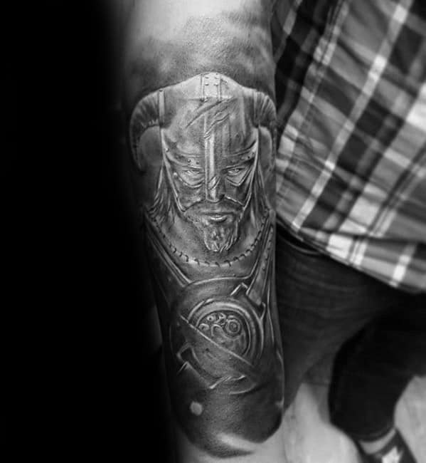 Skyrim-inspired tattoo of a horned warrior in armor on a person's arm
