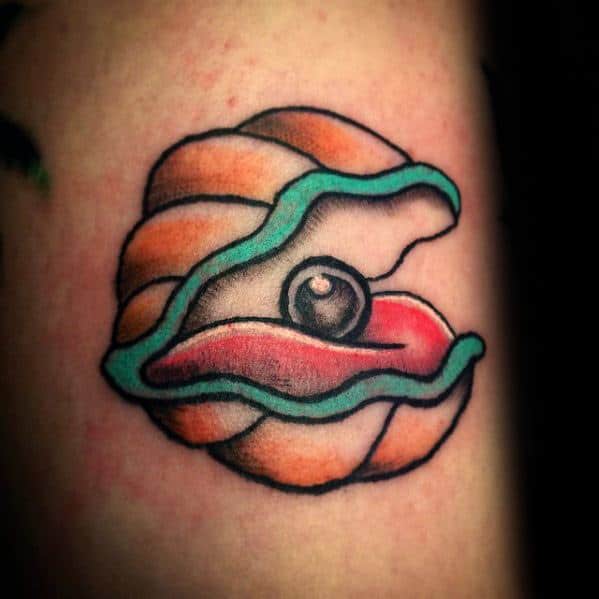 Bold neo-traditional clam tattoo with orange shell, teal outline, and a shiny black pearl resting on a vivid red interior.