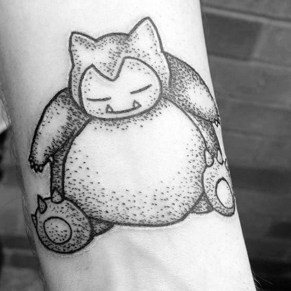 Blackwork Snorlax tattoo with detailed dotwork shading, eyes closed in a calm pose on the inner forearm.