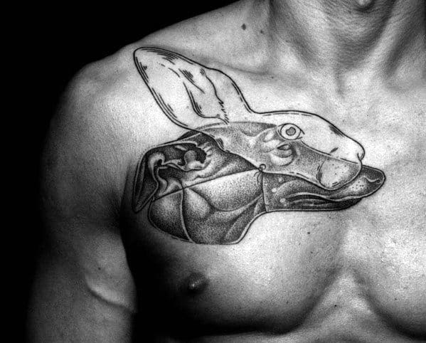 A detailed and artistic tattoo featuring a greyhound’s head, with geometric and abstract elements seamlessly blending into the structure of the dog's face and neck.