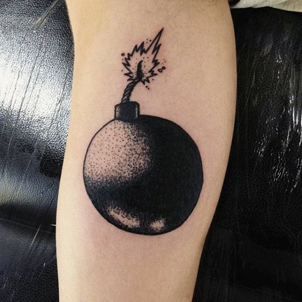 Male With Dark Round Bomb Tattoo On Arms