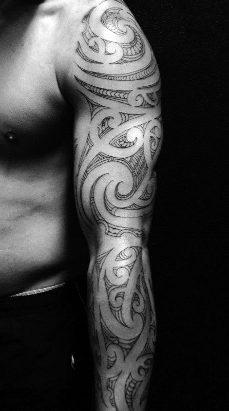 Male With Full Arm Tribal Sleeve Tattoo Design