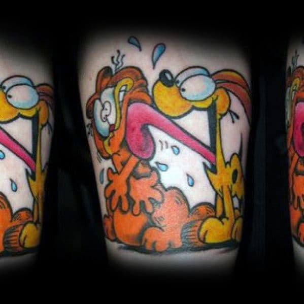 Vibrant Garfield and Odie tattoo with Odie playfully licking a grumpy Garfield—fun, dynamic design capturing their classic rivalry.