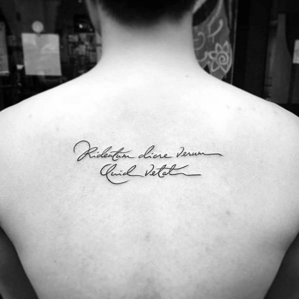 Male With Handwritten Latin Quote Tattoo Ideas On Upper Back