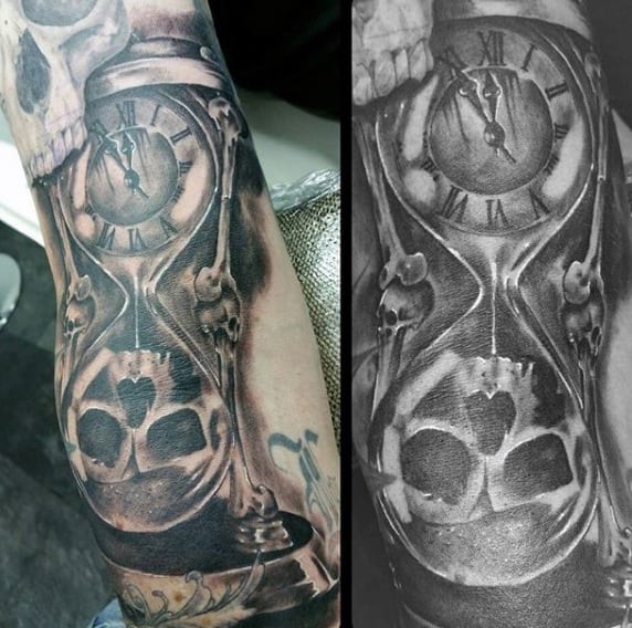 Male With Hourglass And Skull Bone Tattoo On Arm