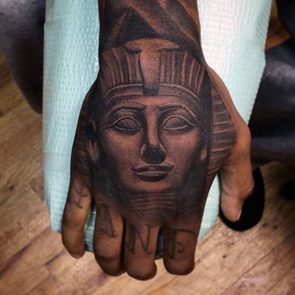 Male With King Tut Shaded Hand Tattoo