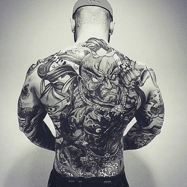 Male With Modern Full Back Tattoo In Black And Grey Ink