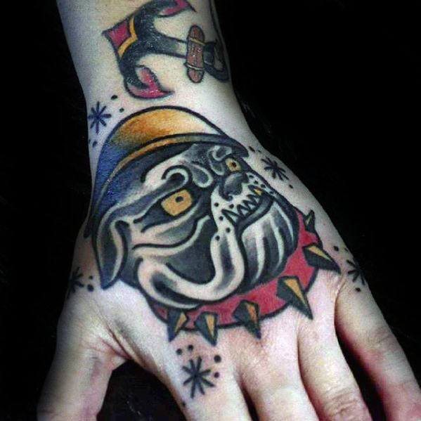 Male With Old School Hand Tattoo With Bulldog Traditional Design