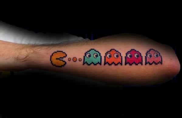 Male With Outer Forearm Pacman And Ghost Tattoo Design
