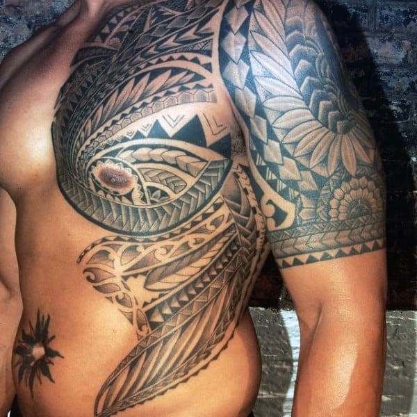 Male With Polynesian Chest And Rib Cage Side Tattoo
