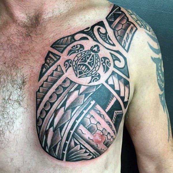 Male With Polynesian Tribal Turtle Chest Tattoo