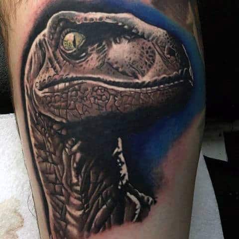 Male With Realistic 3d Velociraptor Head Tattoo On Arm