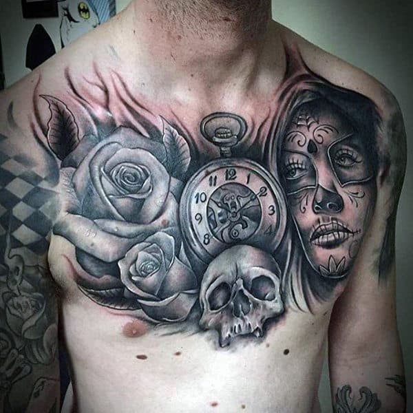 Male With Rose Time Piece Skull And Day Of The Dead Lady Tattoo Chest
