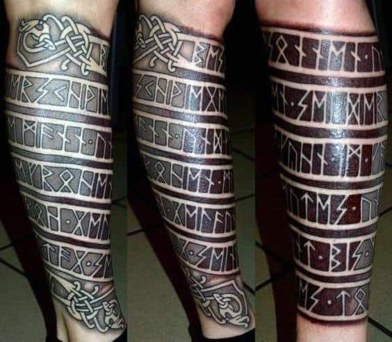 Male With Rune Leg Sleeve Tattoo