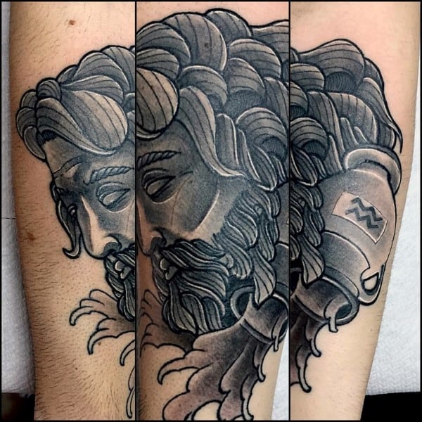 Male With Shaded Aquarius Forearm Tattoos