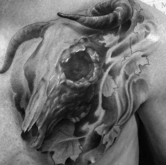 Male With Shaded Leaf Bull Skull Chest Tattoos
