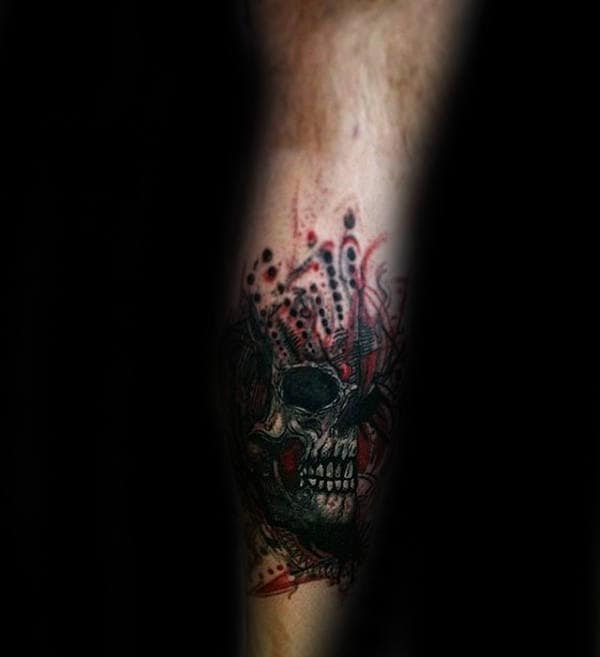 Male With Skull Trash Polka Tattoo On Leg Calf