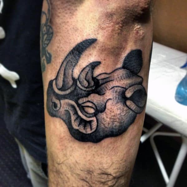 Male With Small Rhino Arm Tattoo