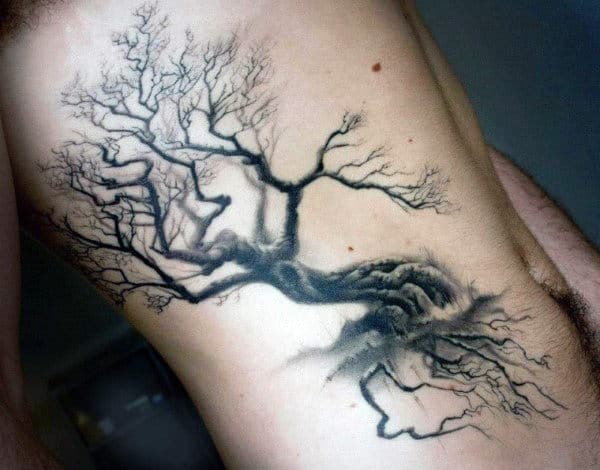 Male With Spooky Oak Tree Tattoo On Torso