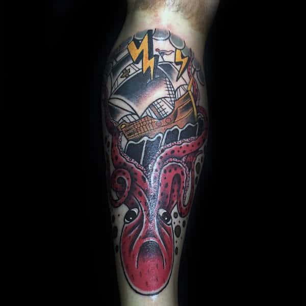 Male With Tattoo Of Japanese Style Kraken And Ship On Back Of Legs