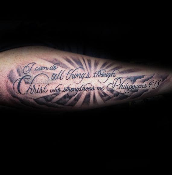 Male With Tattoo Of Philippians 4 13 Bible Verse On Outer Forearm