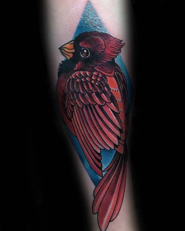 Male With Tattoo Of Red Cardinal And Blue Ink Background Design