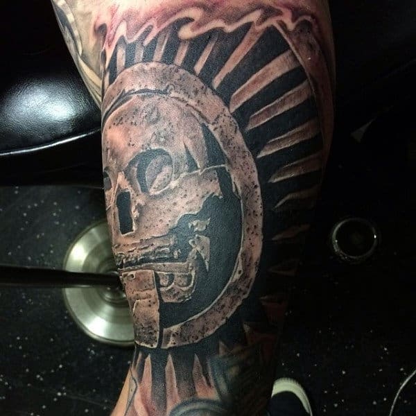 Male With Tattoo Of Stone Skull And Stairs On Arm