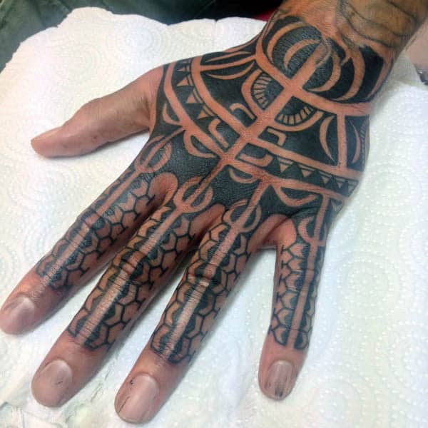 Male With Tribal Hand Tattoo