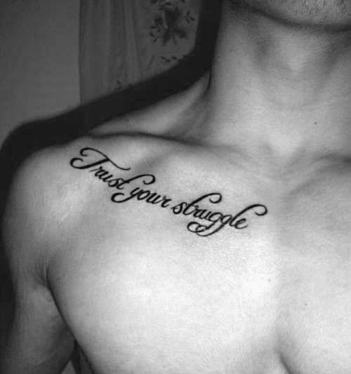 Male With Trust Your Stuggle Collar Bone Tattoo