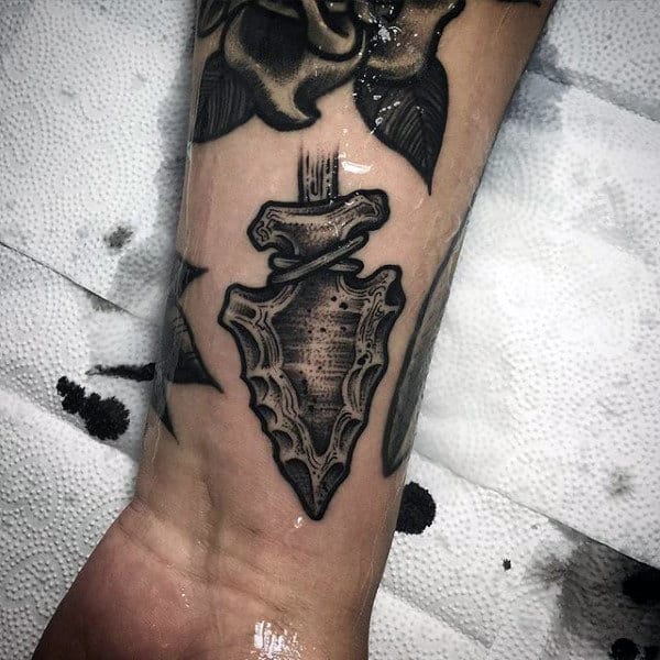 Male Wrist Leaden Arrowhead Tattoo