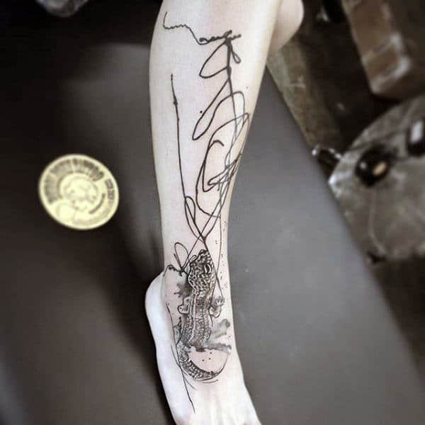 Males Lower Legs Scribbles And Lizard Tattoo