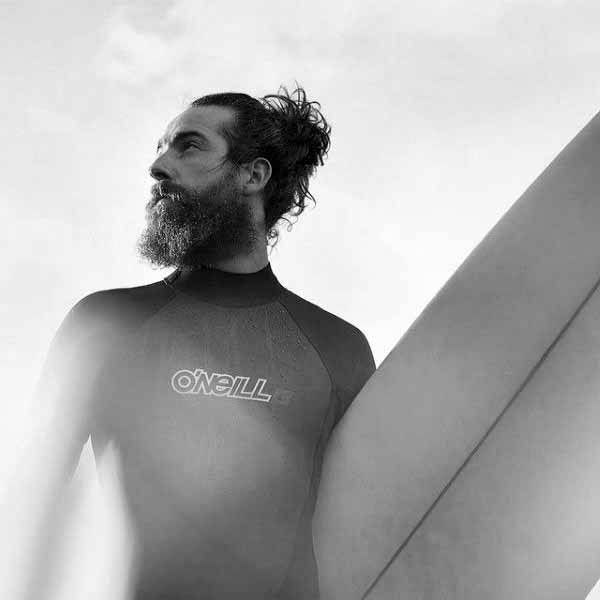 Man Bun Sufer Hairstyle For Guys