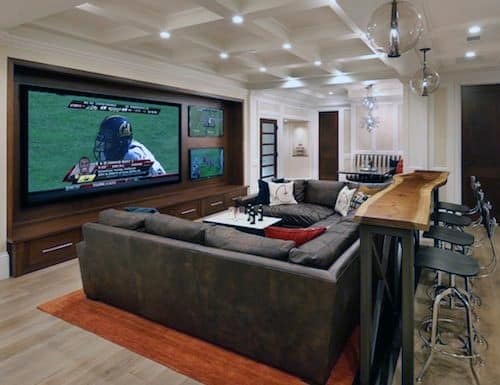 basement man cave large screen tv sofa wood bar 