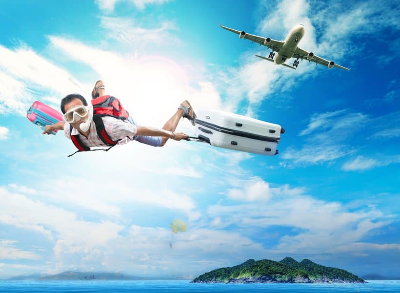 man flying on blue sky