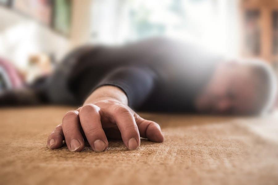 man lies unconscious in his apartment