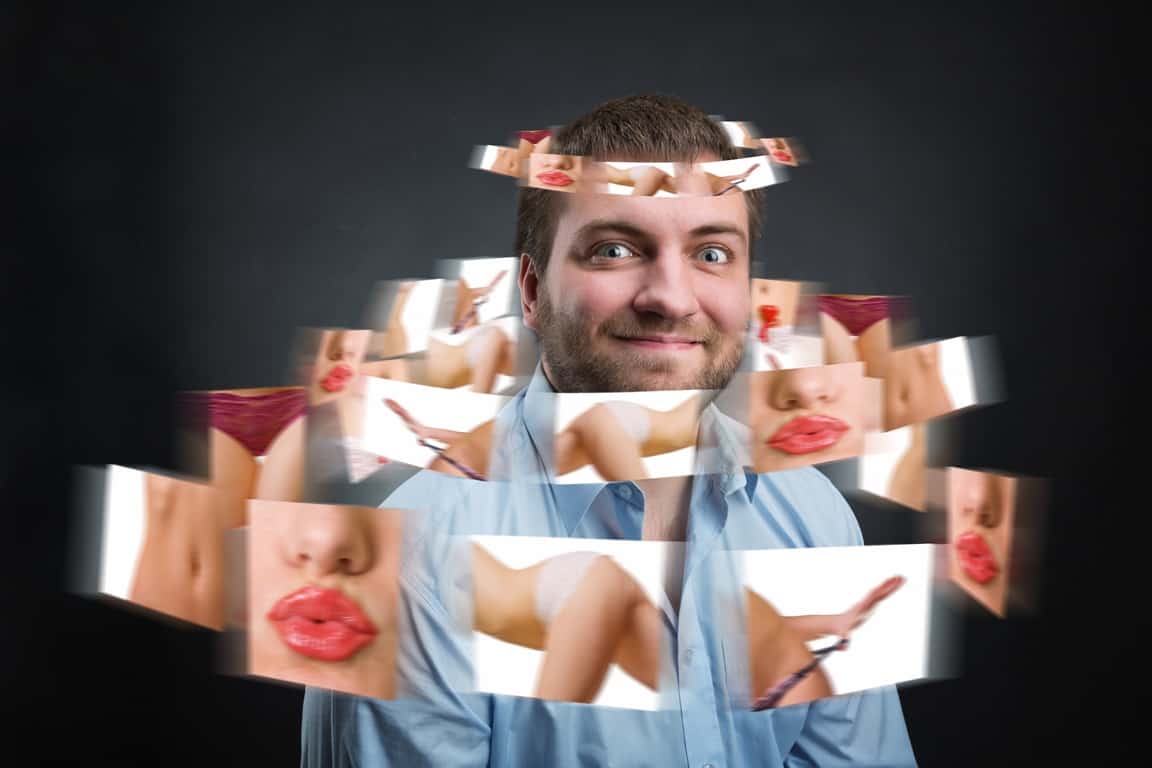 man smiling while thinking of women