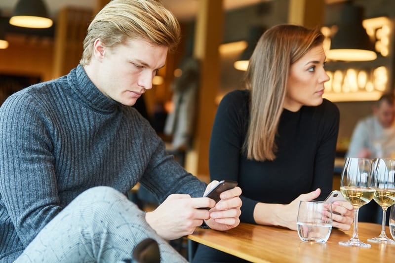 man texting on the phone