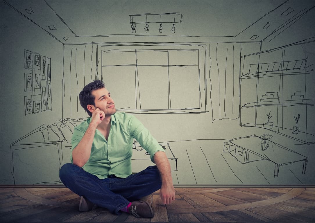 man thinking of furnushing his apartment