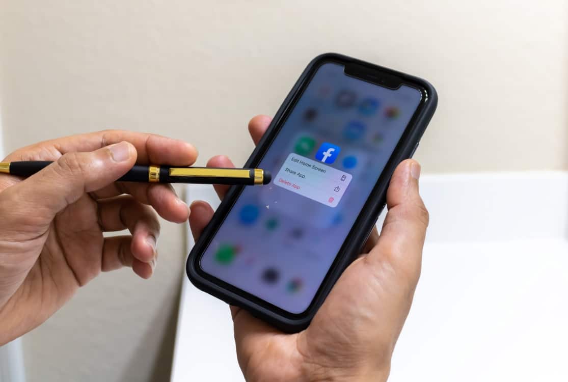 man using facebook account