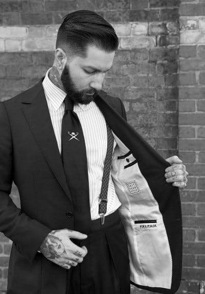 Man Wearing Suit With Sohpisticated Classy Hairstyle