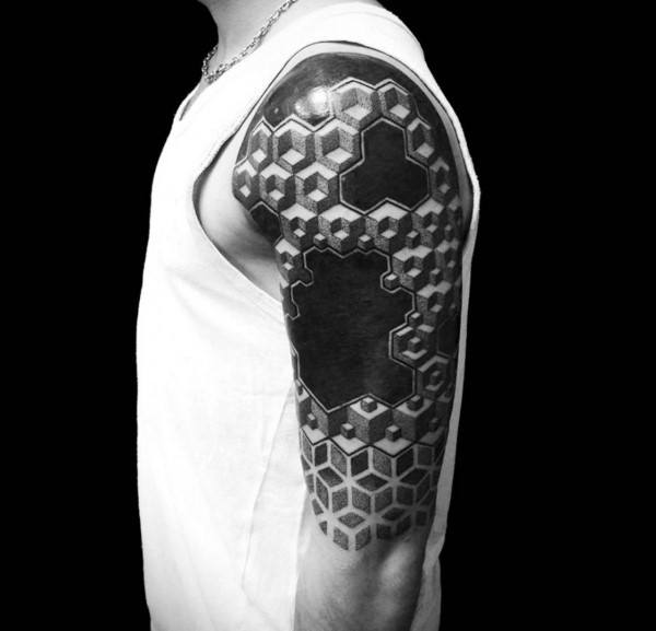 Man With 3D Honeycomb Hexagonal Blocks Tattoo On Upper Arms