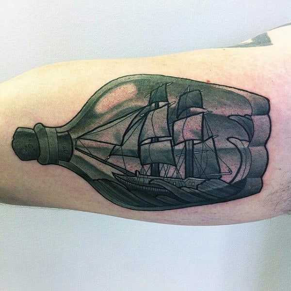 Man With 3d Bicep Ship In A Bottle Tattoo