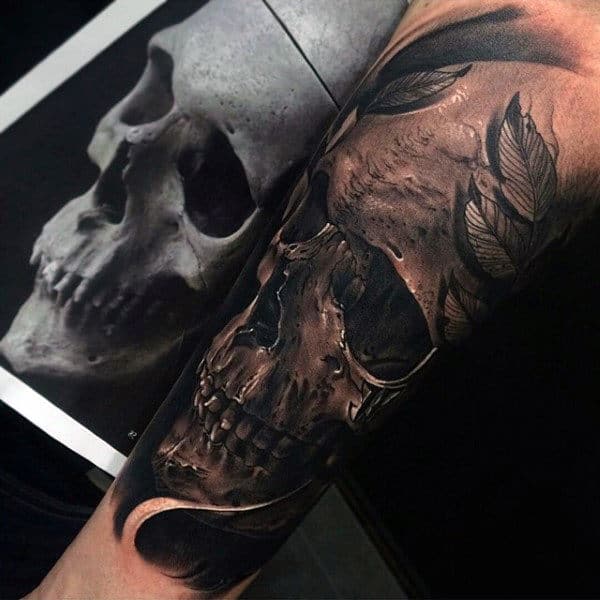 Man With 3d Inner Forearm Realistic Skull Design Tattoo