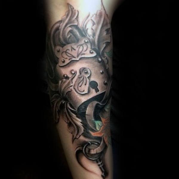Man With 3d Lock Tattoo On Outer Arm