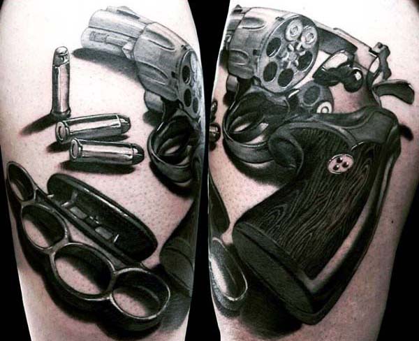 Man With 3d Revolver Tattoo And Bullet Design In Black Ink