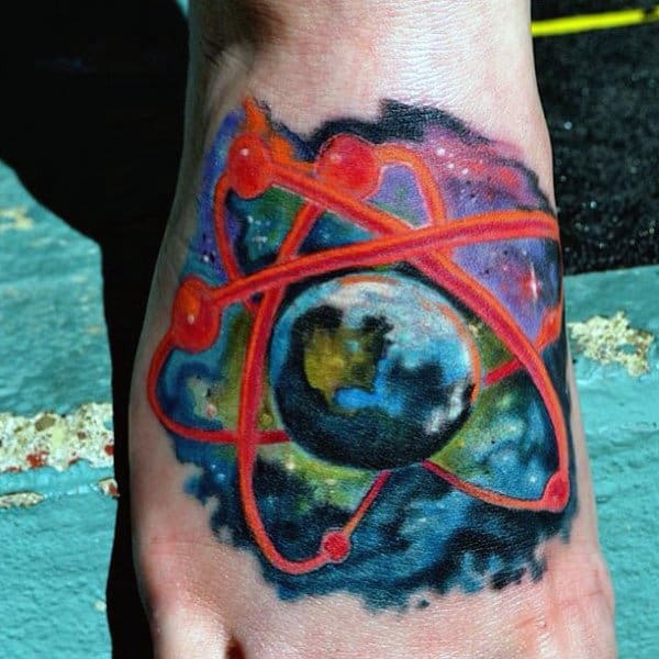 Man With Atom Earth Foot Tattoo