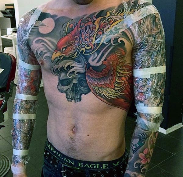 Man With Awesome Sleeve Tattoos And Upper Chest Ink
